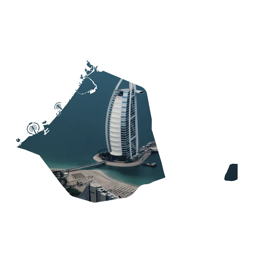 Aerial view of Dubai showcasing the iconic Burj Al Arab surrounded by the shimmering waters of the Arabian Gulf in the background showcasing the CoCoach presence in the United Arab Emirates.