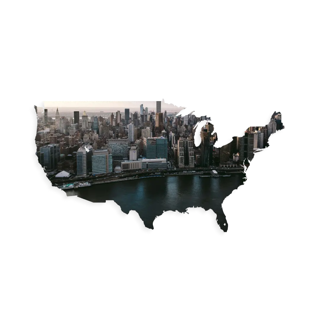 Aerial view of the United States featuring the New York City skyline with surrounding waterways in the background showcasing the CoCoach presence in the United States of America.