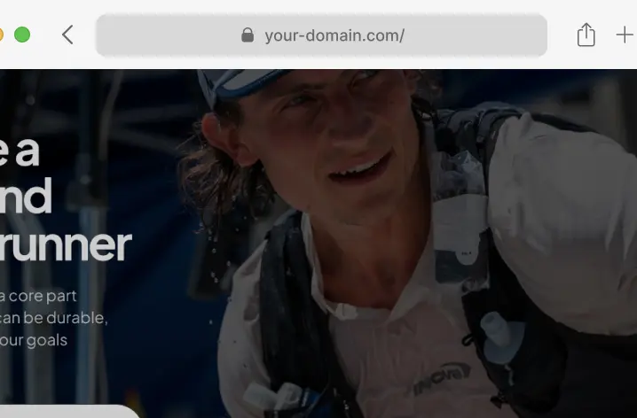 Browser address bar showing a custom domain URL for a coach’s personalised website.