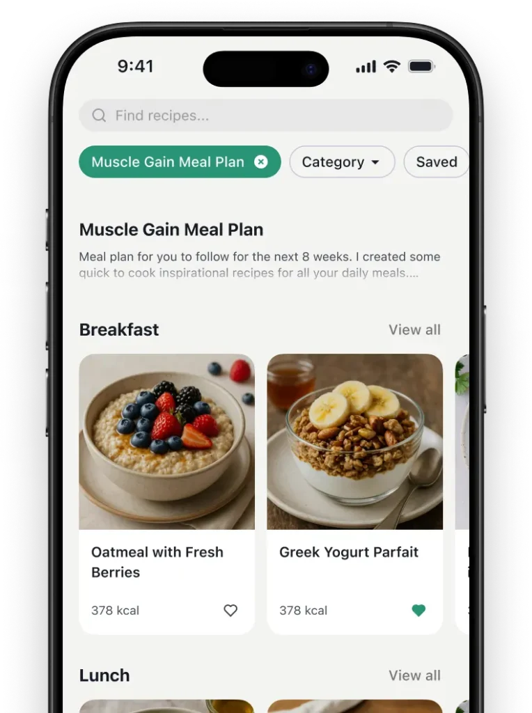 Mobile app screen showing a muscle gain meal plan with healthy breakfast recipes like oatmeal with berries and Greek yogurt parfait.