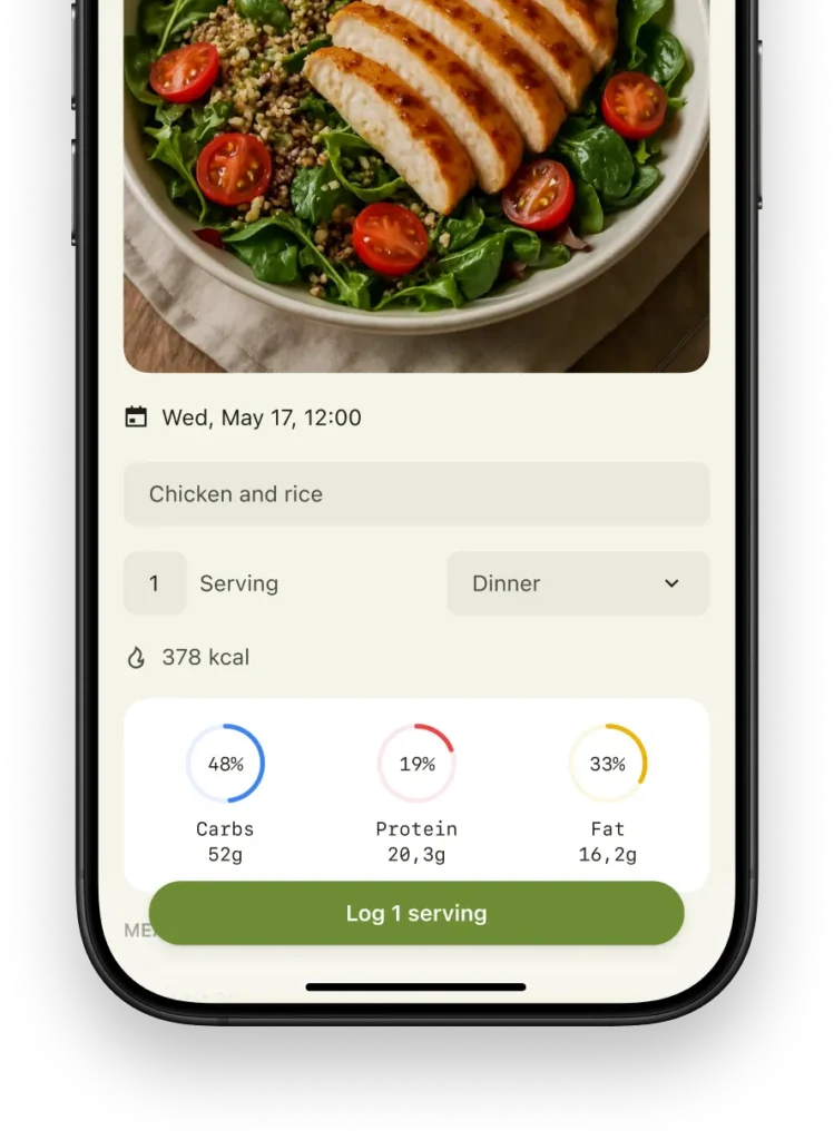 Meal logging screen showing grilled chicken salad with nutrition breakdown of carbs, protein, and fat, and an option to log one serving.